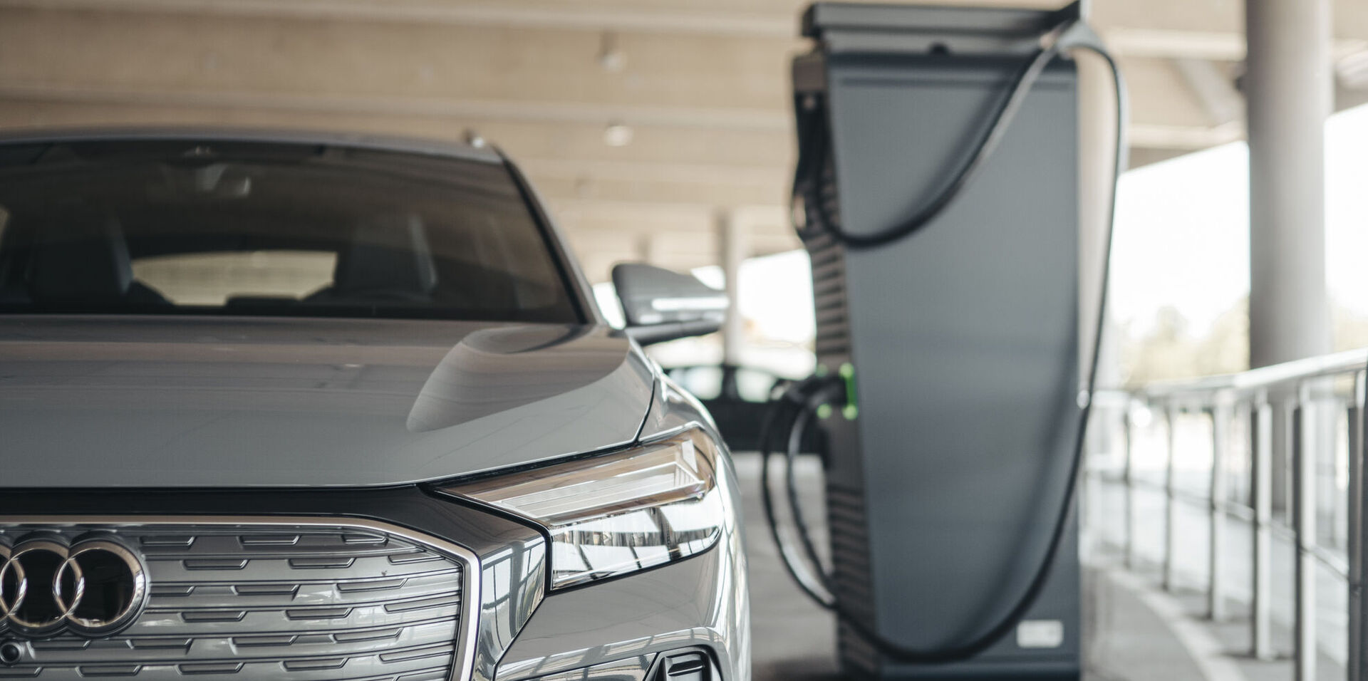 POWER Charger from MOON with cable management system charges an audi