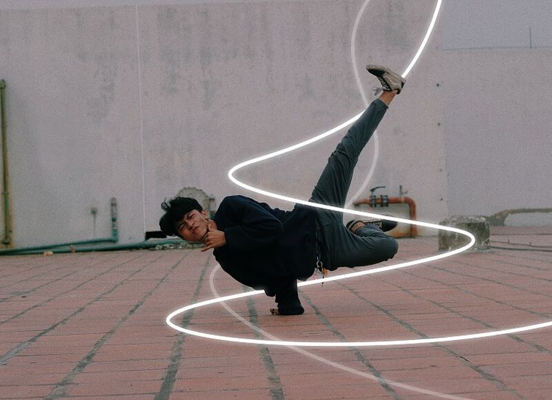 man dances with the light from MOON