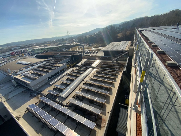 Photovoltaic system on the roof of SEAT Harb car dealership, flight view